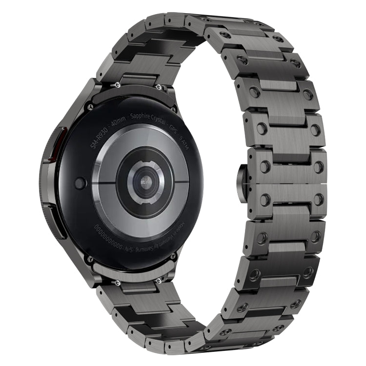 Stylish stainless steel strap for Samsung Galaxy Watch 6 in silver, black, and titanium gray colors, showcasing its butterfly snap design.